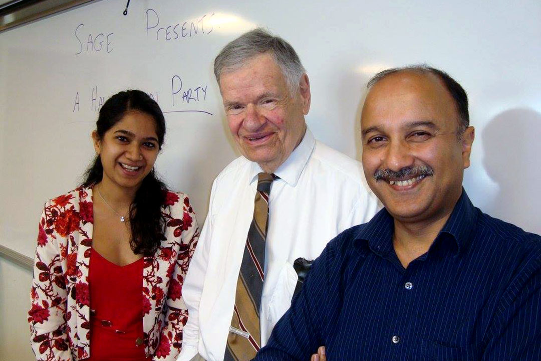 Herman Stekler (center) at a Center for Economics Research event